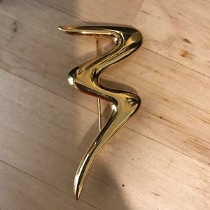 Vintage Trifari gold squiggle pin